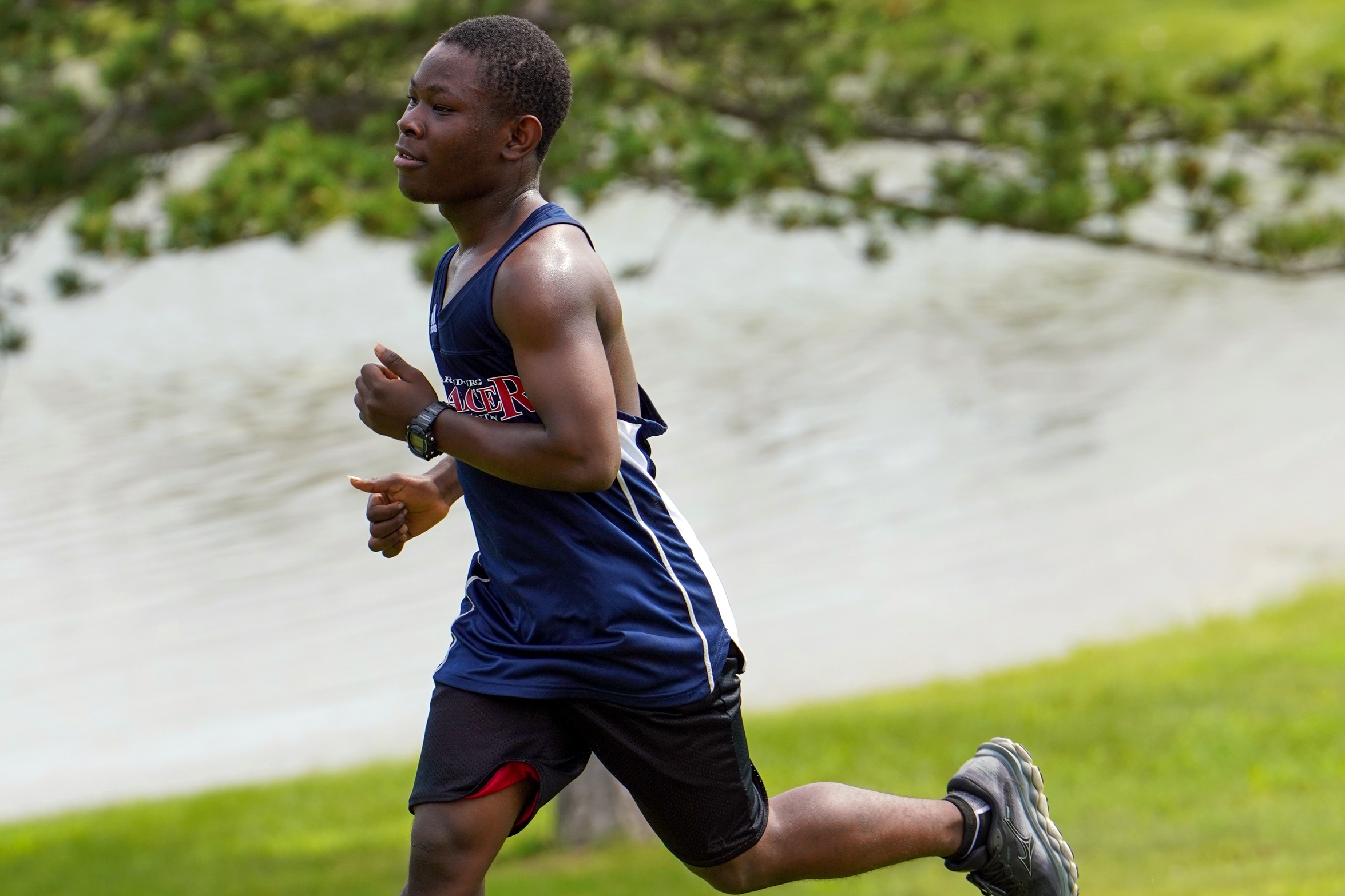 Sandburg men's cross country runner Larry Kamara in a race during his freshman season.